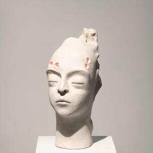 Piccola testa illuminata 17, 2015, Terracotta e luci led, 14x24x20cm