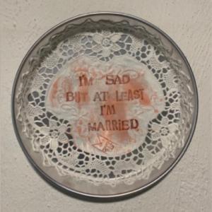 I'm sad, 2023, Inchiostro e ceretta epilatoria su centrino da Corredo, 25cm